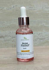 Face oil bottle for acne relief with saffron infusion.
