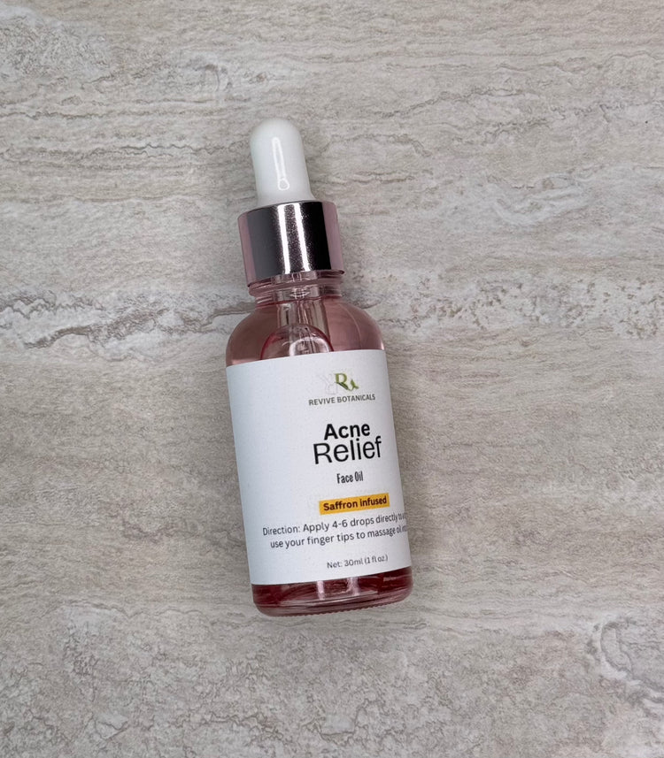 Acne relief face oil in glass dropper bottle for clear skin.
