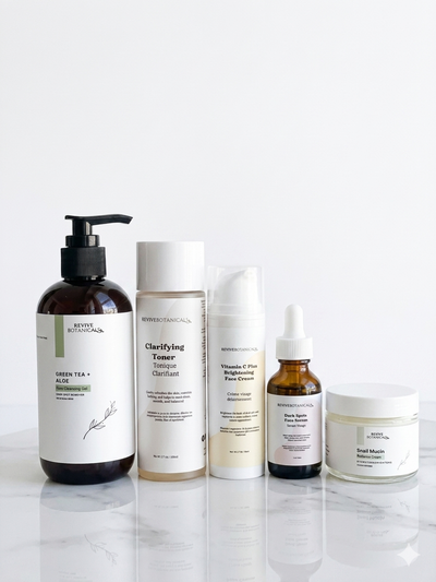 Hyperpigmentation Set skincare products including cleanser, toner, serum, face cream, and radiance cream for acne and dark spots