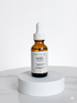 Dark Spots Face Serum bottle with natural ingredients for brightening skin